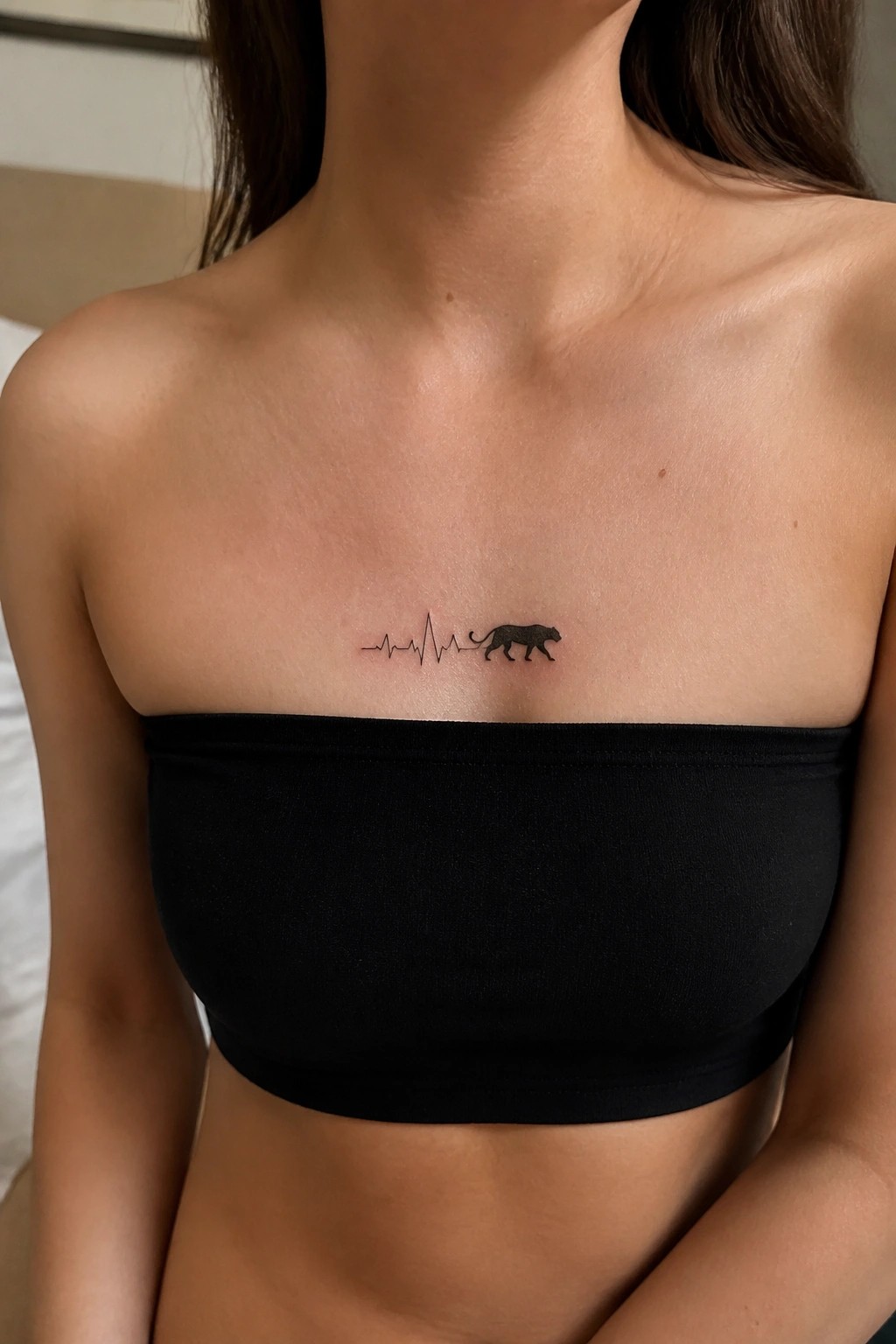 Black bandeau top with heartbeat line and panther chest tattoo