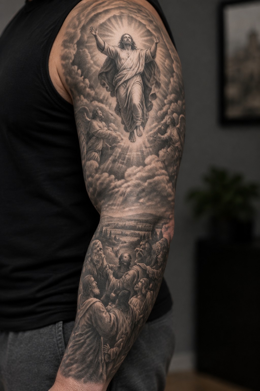 Black and gray tattoo of Jesus ascending with angels above a crowd on man's arm.