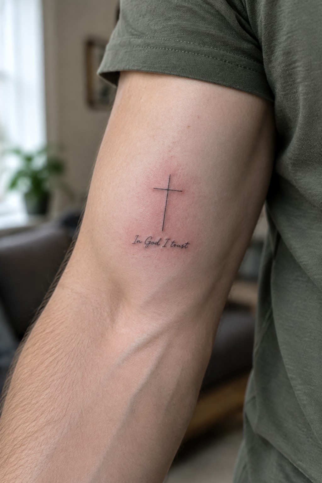 Black cross tattoo with