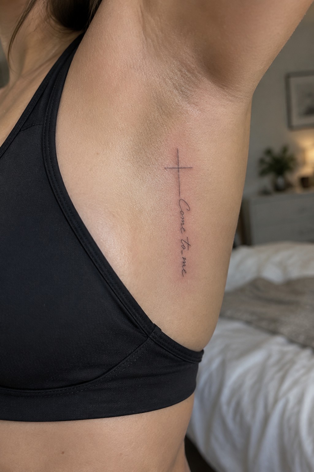 Woman in black tank top with cross and 