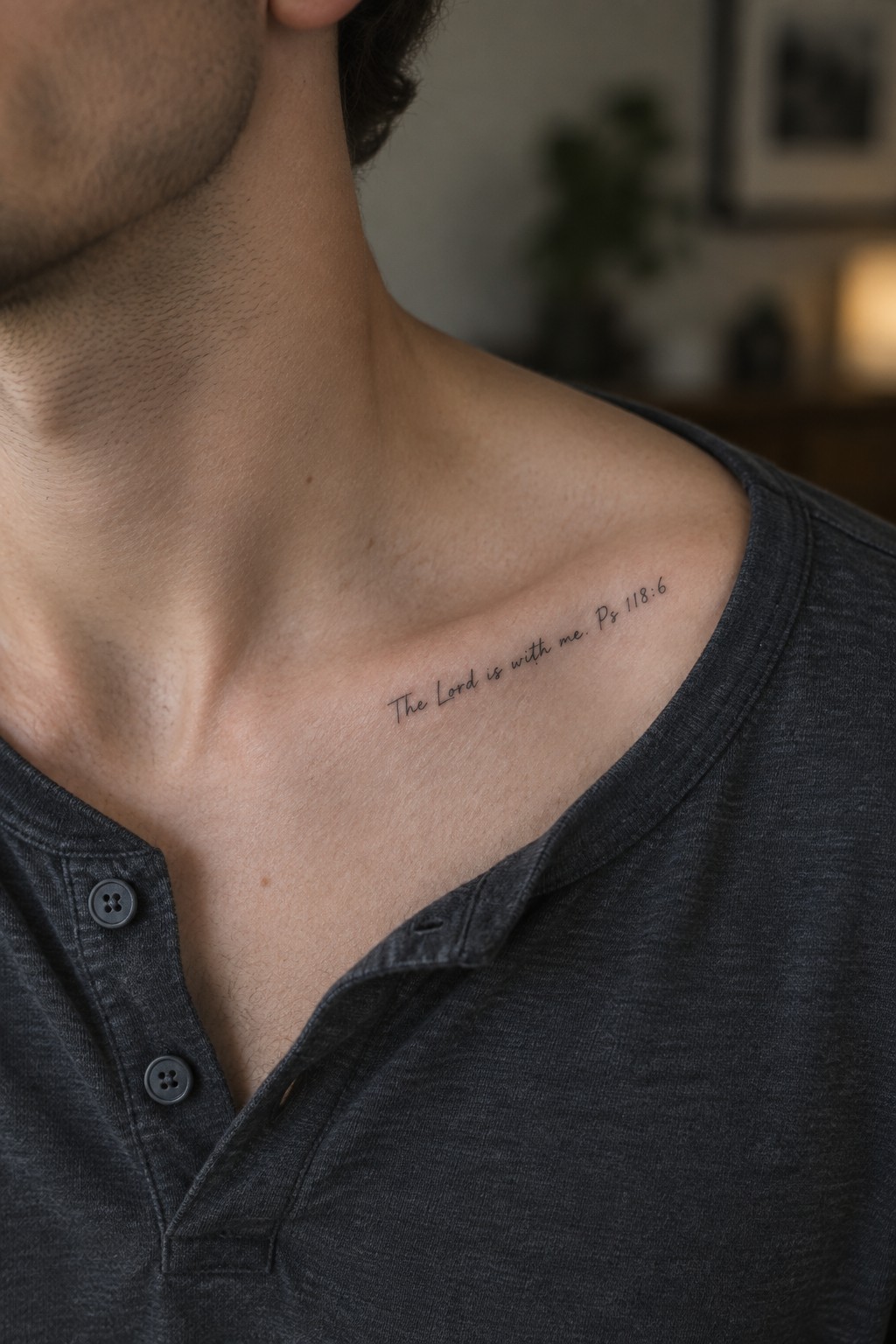 Man's collarbone tattoo 