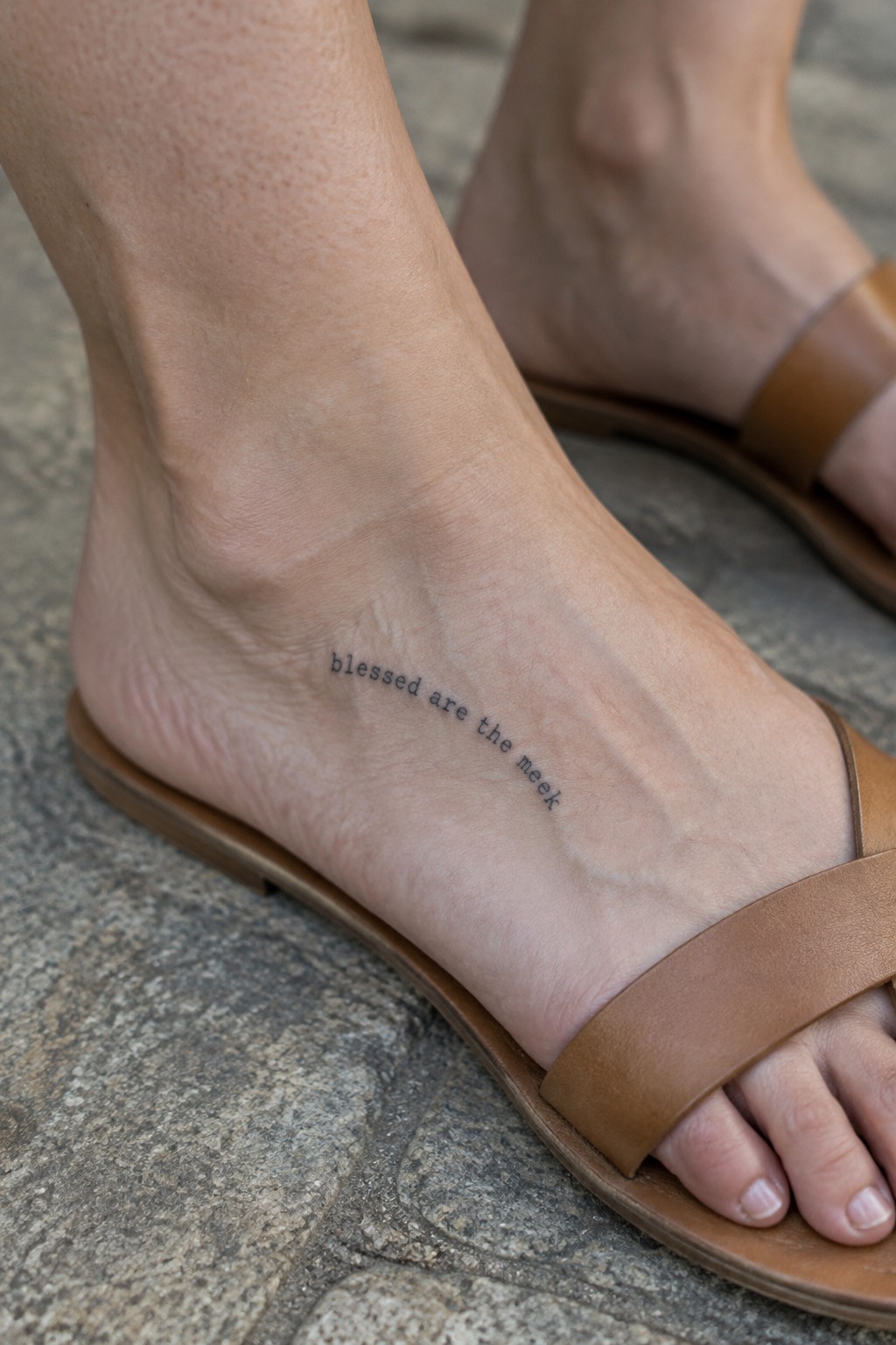 Small script tattoo reading