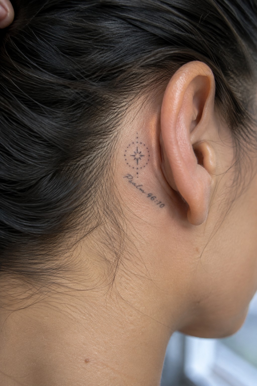 Fine line star tattoo with