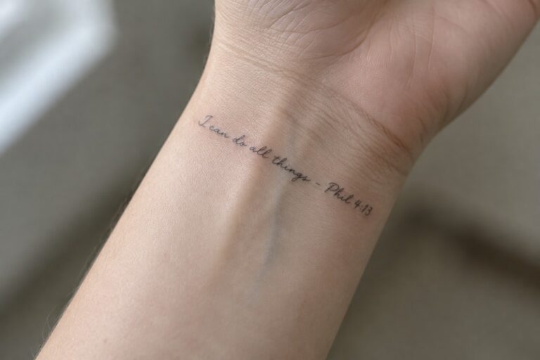 20 Fine-Line Scripture Tattoos Featuring Delicate Lettering Fine line cursive tattoo reading "I can do all things - Phil 4:13" on the inner wrist